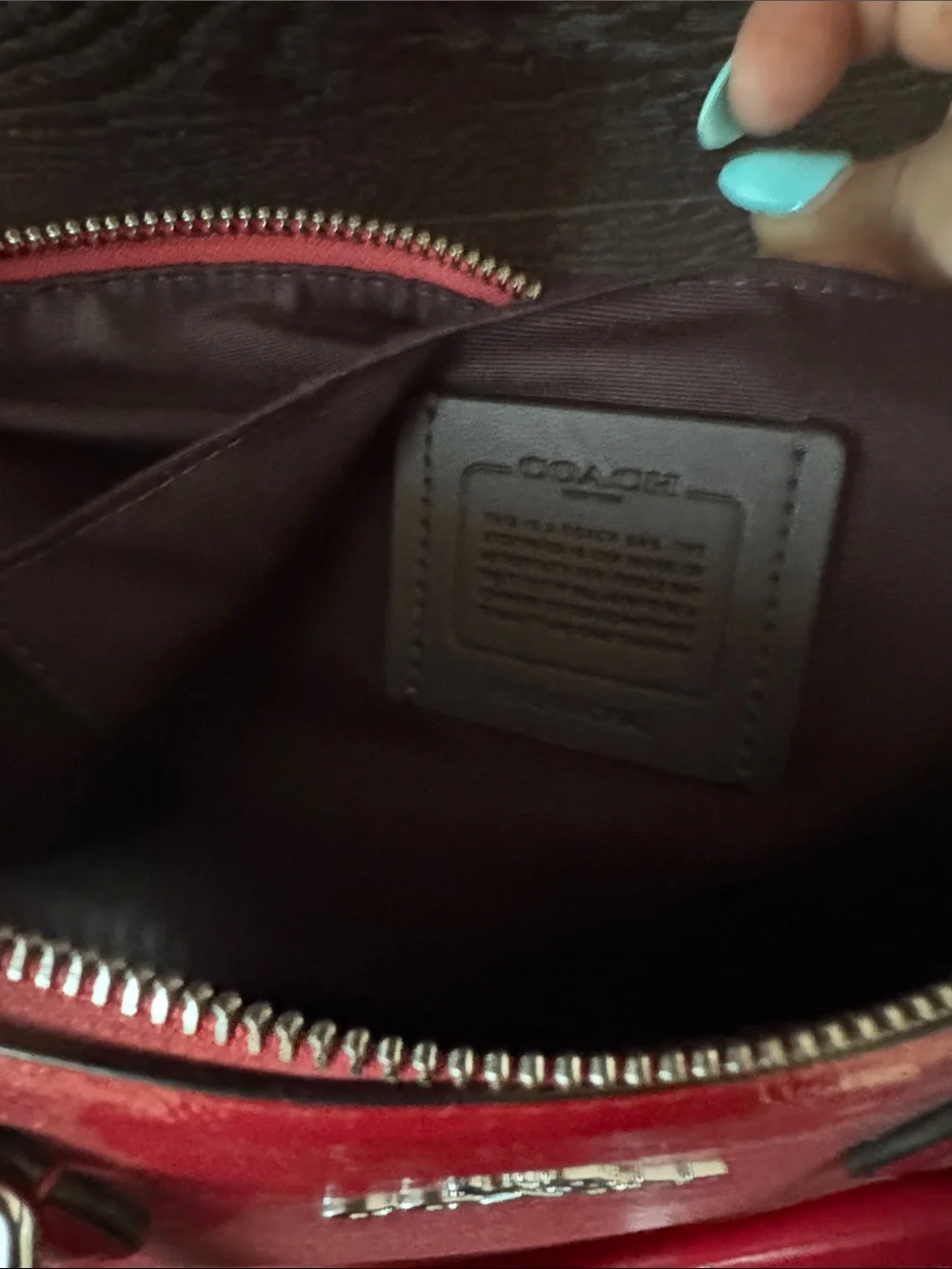 Coach glossy red